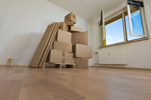 Packed boxes and furniture ready for a flat move in Soho