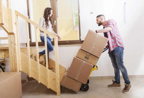 Packed household boxes and furniture ready for local removals in Soho