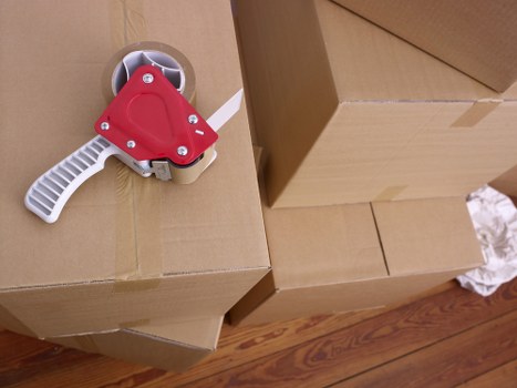 Furniture and boxes prepared for a removal van in Soho