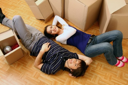 Business relocation packing and labelled boxes prepared for a Soho office move