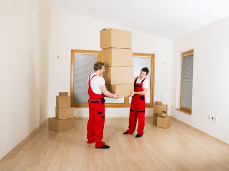 Furniture and boxes being loaded into a van for a Soho move