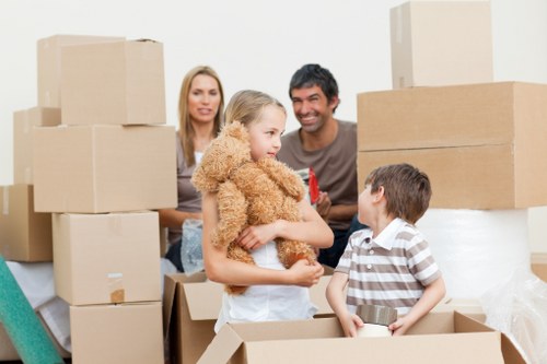 Packed boxes and furniture prepared for a Soho relocation